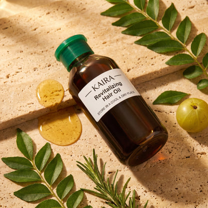 KAIRA Revitalizing Hair Oil with golden oil drip, amla and curry leaves
